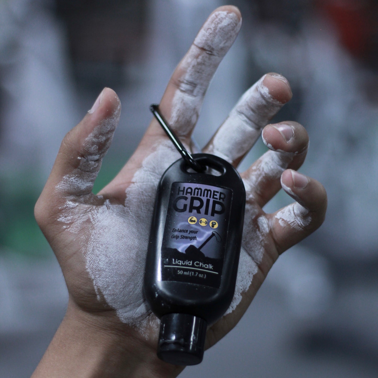 liquid chalk bottle in hand with applied liquid chalk
